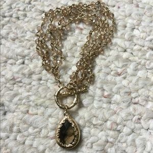 Gold bracelet with amber stones